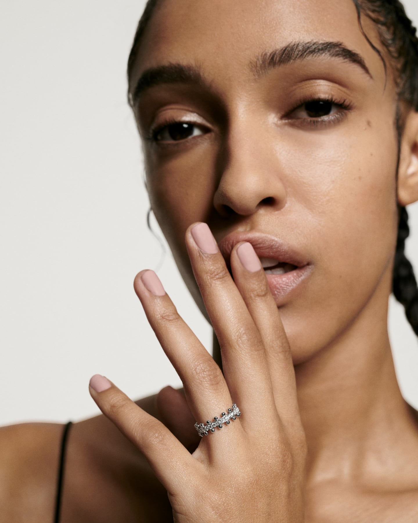 hand wears beaded ring of lab grown diamonds & 18k recycled white gold for oscar massin jewelry